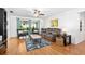 Cozy living room with hardwood floors, comfortable seating, bright natural light, and stylish decor at 13 Sandcastle Dr, Ormond Beach, FL 32176