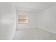 Bright bedroom with tile flooring and window, providing ample natural light at 140 Orchid Woods Ct # 7A, Deltona, FL 32725
