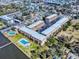 Aerial view of apartments with a community pool, ample parking, and close proximity to the intercoastal waterway at 144 S Halifax Ave # 86, Daytona Beach, FL 32118