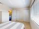 Inviting bedroom features neutral tones, a large closet, and a serene atmosphere for restful nights at 144 S Halifax Ave # 86, Daytona Beach, FL 32118