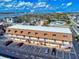 Apartment building featuring designated parking spaces and a well-kept exterior, close to local transit at 144 S Halifax Ave # 86, Daytona Beach, FL 32118