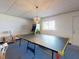 Fun game room featuring a ping pong table, Pac-Personal arcade game, and ambient lighting for entertainment at 144 S Halifax Ave # 86, Daytona Beach, FL 32118
