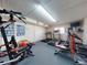 Well-equipped exercise room with modern treadmills, fitness equipment, and motivational charts for effective workouts at 144 S Halifax Ave # 86, Daytona Beach, FL 32118