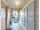 Well-lit mail room features secure mailboxes, tile floors, and a view to the outside at 144 S Halifax Ave # 86, Daytona Beach, FL 32118