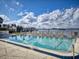 Beautiful pool overlooking the water with lounge chairs available for residents and guests to use at 144 S Halifax Ave # 86, Daytona Beach, FL 32118