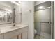 Bathroom featuring a vanity and tiled shower at 160 Limewood Pl # 1, Ormond Beach, FL 32174