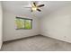 Bedroom with carpeted flooring, ceiling fan, and natural light at 160 Limewood Pl # 1, Ormond Beach, FL 32174