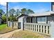 Well-kept home featuring a fenced front yard and a welcoming entrance with manicured landscape at 160 Limewood Pl # 1, Ormond Beach, FL 32174