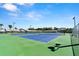 A beautiful community tennis court with residences in the background at 160 Limewood Pl # 1, Ormond Beach, FL 32174