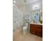 Well-maintained bathroom features a vanity and a shower with curtain at 1750 Savannah Ln, Port Orange, FL 32128