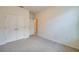 Comfortable carpeted bedroom with a double door closet at 1750 Savannah Ln, Port Orange, FL 32128