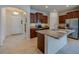 Well-appointed kitchen featuring granite countertops, stainless steel appliances, and ample cabinet space at 1750 Savannah Ln, Port Orange, FL 32128