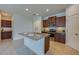 Modern kitchen with stainless steel appliances, granite countertops, and a spacious island at 1750 Savannah Ln, Port Orange, FL 32128