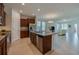 Modern kitchen features stainless steel appliances, granite countertops, and open floor plan at 1750 Savannah Ln, Port Orange, FL 32128