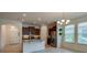 Bright kitchen with granite countertops, stainless appliances, and ample natural light at 1750 Savannah Ln, Port Orange, FL 32128