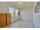 Bright, airy room with tile floors, large windows, and natural light at 1750 Savannah Ln, Port Orange, FL 32128