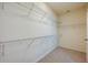 Large walk-in closet with ample shelving for organization and storage at 1750 Savannah Ln, Port Orange, FL 32128
