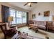 Cozy living room filled with ample natural light at 1983 Stacey Cir, Deltona, FL 32738