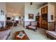 Open floor plan with vintage decor, built-in shelving, and natural light at 1983 Stacey Cir, Deltona, FL 32738