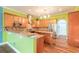 Eat-in kitchen featuring stainless steel appliances, granite countertops, and wood flooring at 20 Promenade At Lionspaw, Daytona Beach, FL 32124