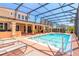 Resort-style screened-in pool with plenty of room for fun and relaxing, a backyard oasis at 20 Promenade At Lionspaw, Daytona Beach, FL 32124