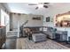 Inviting living room with staircase, modern decor and plenty of natural light at 2057 Hillview Circle, Deltona, FL 32738
