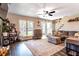 Inviting living room with staircase, modern decor and plenty of natural light at 2057 Hillview Circle, Deltona, FL 32738