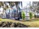 Home's pool, featuring a screened-in enclosure and backyard at 2057 Hillview Circle, Deltona, FL 32738