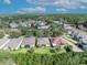 An aerial view of the homes featuring beautiful lush landscaping including screened in back porches at 212 Stonington Way, Deland, FL 32724