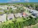An aerial view of the homes featuring beautiful lush landscaping including screened in back porches at 212 Stonington Way, Deland, FL 32724