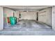 Spacious two-car garage with ample storage space and utility hookups at 212 Stonington Way, Deland, FL 32724