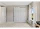 Bright room with closet features a light wall color and plush carpet at 2236 Oconnel Dr, Ormond Beach, FL 32174
