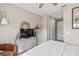 Cozy bedroom featuring stylish decor, soft lighting, and a comfortable sitting area at 2236 Oconnel Dr, Ormond Beach, FL 32174
