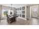 Inviting dining room boasts a large table, elegant decor, and plenty of natural light at 2236 Oconnel Dr, Ormond Beach, FL 32174