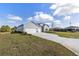 Lovely single-story home boasts three-car garage and a spacious driveway at 2236 Oconnel Dr, Ormond Beach, FL 32174