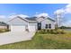 Charming single-story home with a three-car garage and well-maintained landscaping at 2236 Oconnel Dr, Ormond Beach, FL 32174