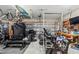 Garage is a gym and has weightlifting equipment, bikes, and storage at 2236 Oconnel Dr, Ormond Beach, FL 32174