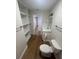 Modern bathroom with built-in shelving and a single sink vanity at 266 N High St, Lake Helen, FL 32744