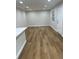 Bright and airy living room featuring sleek floors and a neutral color palette at 266 N High St, Lake Helen, FL 32744