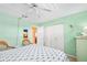 Bright bedroom with a nautical theme, offering ample closet space and neutral carpeting at 2711 N Halifax Ave # 890, Daytona Beach, FL 32118