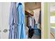 Bedroom closet filled with clothes and storage items at 2711 N Halifax Ave # 890, Daytona Beach, FL 32118