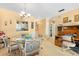 Dining area with glass table and seating, conveniently located near the kitchen at 2711 N Halifax Ave # 890, Daytona Beach, FL 32118