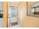 Inviting entryway with tiled floor, closet and mirror, leading to the main living area at 2711 N Halifax Ave # 890, Daytona Beach, FL 32118