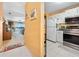 View from the kitchen to the living room and beautiful waterfront views at 2711 N Halifax Ave # 890, Daytona Beach, FL 32118
