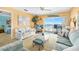 Cozy living room with sliding glass doors to balcony and view at 2711 N Halifax Ave # 890, Daytona Beach, FL 32118