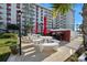 Outdoor grilling and picnic area featuring tables, grills, and lush landscaping, perfect for outdoor entertaining at 2711 N Halifax Ave # 890, Daytona Beach, FL 32118