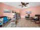 Cozy sitting area with wicker furniture, decorative pillows, and nature-themed art at 2711 N Halifax Ave # 890, Daytona Beach, FL 32118
