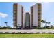 High-rise condo showcases a modern exterior design with multiple balconies and ocean views from every unit at 2967 S Atlantic Ave # 1203, Daytona Beach Shores, FL 32118