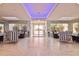 The light filled lobby area features stylish seating, tile flooring, and recessed lighting at 2967 S Atlantic Ave # 1203, Daytona Beach Shores, FL 32118