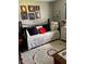 Comfortable bedroom featuring a decorative bed and charming decor at 301 Paradise Ln, Edgewater, FL 32132